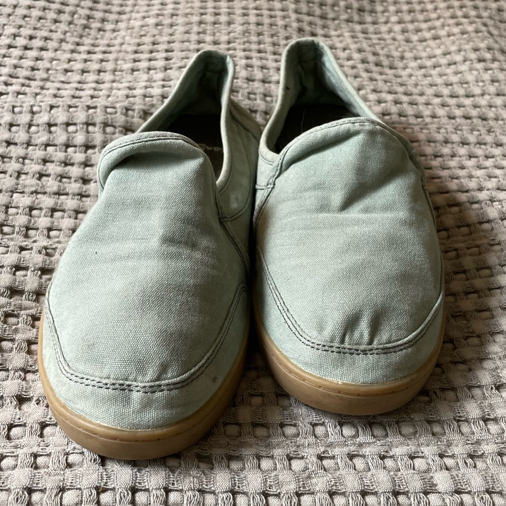 Green sanuk with gun colored bottom